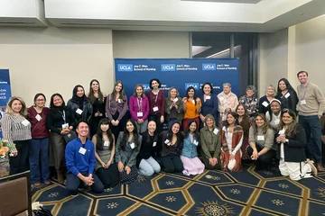 The group of faculty, staff, and alumni at the 2025 UCLA Nursing Doctoral Friendsgiving.