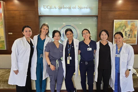 NP students and faculty gathered in the school of nursing.