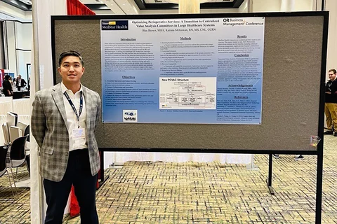 Luigi Estrera with his poster presentation