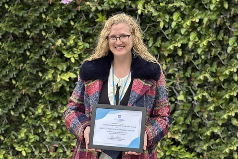 A photo of Kristi Westphaln after receiving the LA NAPNAP award