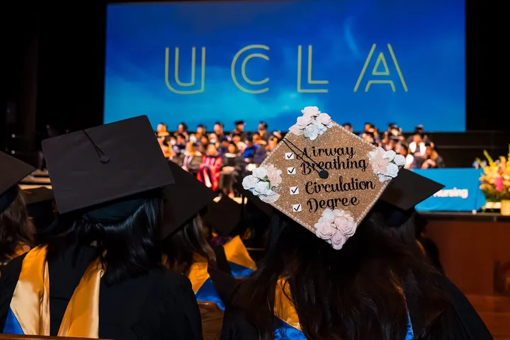 A nursing student's graduation cap at commencement.