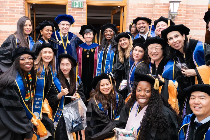 Doctoral students gathered with Chancellor Julio Frenk and Dean Lin Zhan