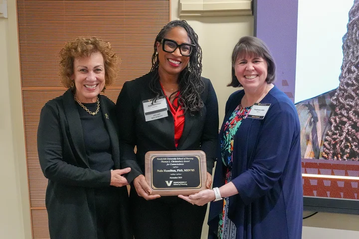 Dr. Nalo Hamilton, center, with Vanderbilt University School of Nursing leaders.
