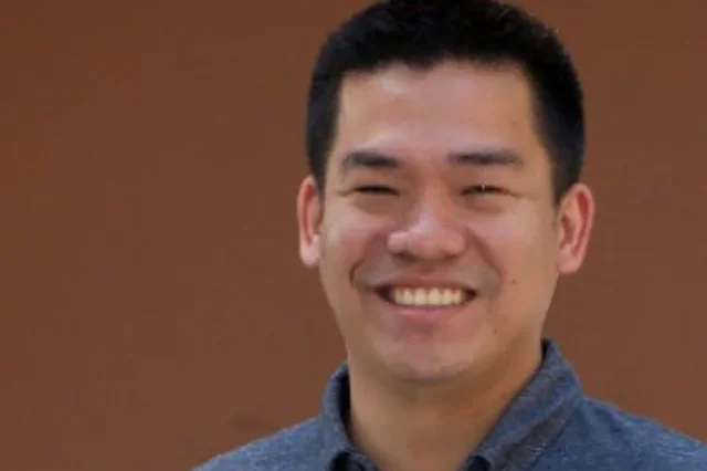 A man smiling for a photo