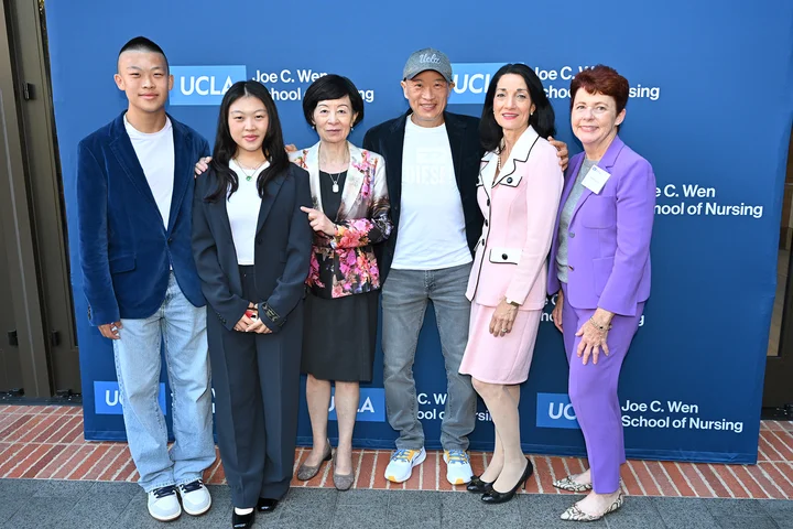 Joe C. Wen and two of his children with Dean Lin Zhan, President Johnese Spisso, and Dr. Karen Grimley