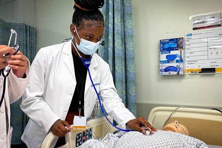 SHPEP students working with a simulation mannequin
