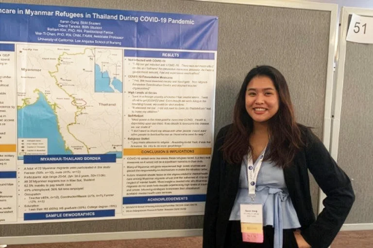 Nursing student Sarah Oung with her research poster.