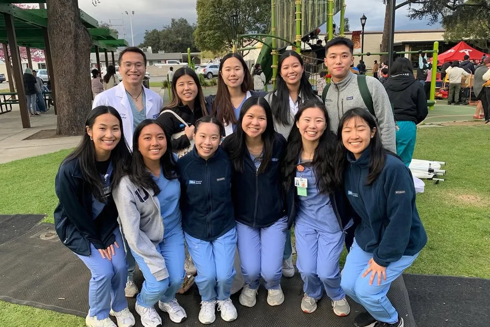 APINSAA students gathered at a volunteer event