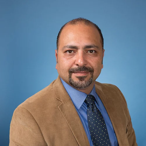 Man wearing a tan suit