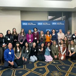 The group of faculty, staff, and alumni at the 2025 UCLA Nursing Doctoral Friendsgiving.