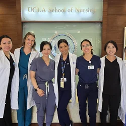 NP students and faculty gathered in the school of nursing.