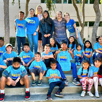 Children gathered with UCLA faculty members leading the Healthy Communities program